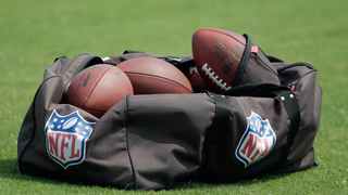 Report: Man (Probably) Took Piss With Two Bags Of Footballs In Tow